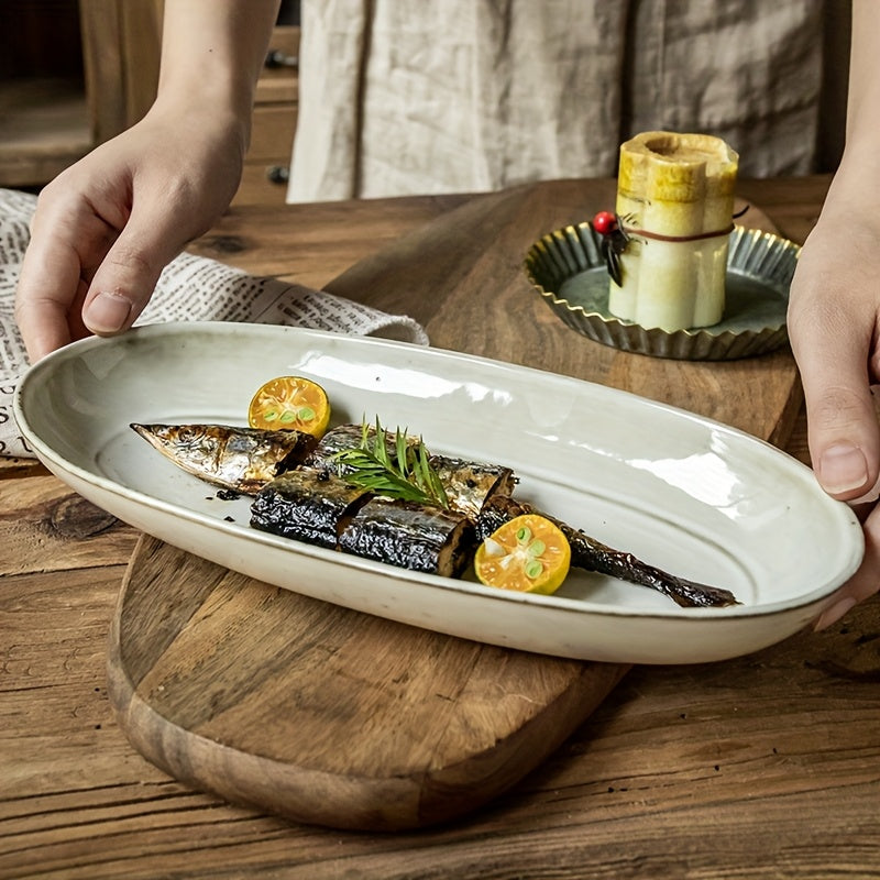 Assiette à poisson ovale vintage en céramique, finition émaillée à changement de cuisson, idéale pour une utilisation domestique, design durable et élégant